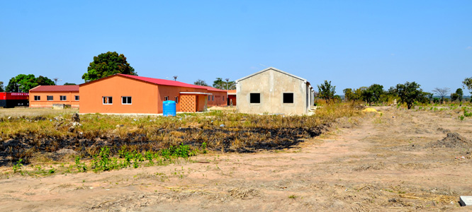 Newly constructed school, with teachers homes under-construction
